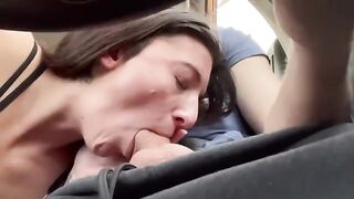 A couple enjoys a road head during their trip in public