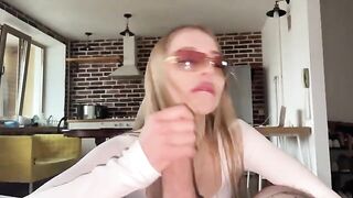 Pretty babe wears glasses and fucks with her boyfriend, getting cum on her face