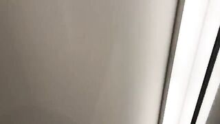 A girl is having fun with the salesman in the fitting room