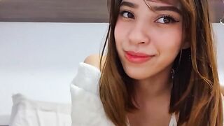A hot girl, Julie Oliver, masturbates with a vibrator until she reaches orgasm