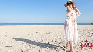 A daring couple gets naked and fucks for the first time on a public beach