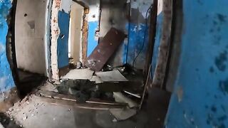 Exhibitionist girl walks through abandoned buildings in POV