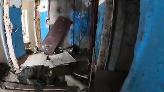 Exhibitionist girl walks through abandoned buildings in POV