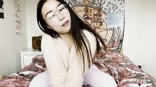 A young Chinese beauty playing with herself on camera