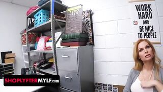 A big-breasted milf is being questioned by the security officer after getting caught in a risky situation