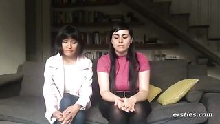 Two girls have lesbian sex with a strapon, showcasing sensual passion