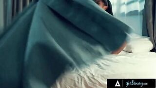 Two young nuns, Alina and Kendra, are caught in a passionate moment