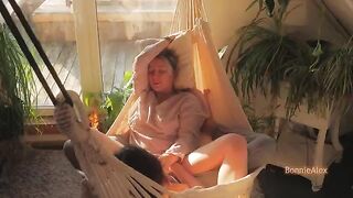 A couple enjoys a passionate and sensual sex session on a sunny day