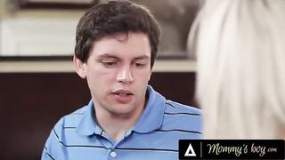 Nina Elle, with her impressive chest, is being spanked by her stepson-in-law