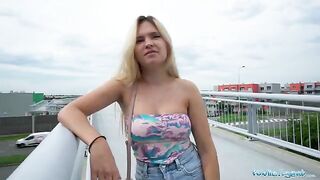 Public Agent Irina Cage flashes her tits and ass on a bridge