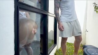 A peep show with a big toy for the new neighbor