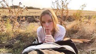 A beautiful Russian blonde has a blowjob in the forest at sunset