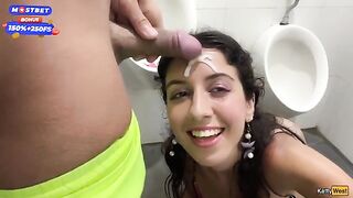 A woman has a BJ in public toilet and gets cum on her face