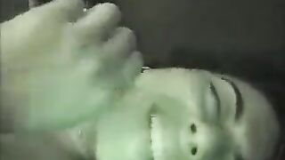 A hot brunette has sex at home in the bedroom, showcasing her natural allure