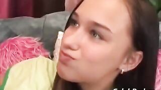 A pretty baby has sex with her adult lover on the couch
