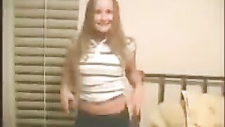 A young girl is having fun with her boyfriend at home