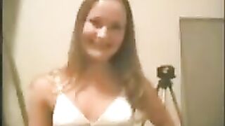 A young girl is having fun with her boyfriend at home