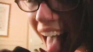 The fool is happy in glasses, getting a dick sucked