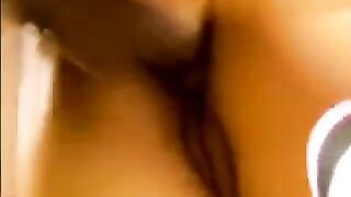 An Asian girl was fucked by two guys at her home in a steamy scene