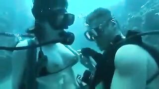 Aqualangists fuck at the depths of the sea, a steamy underwater scene