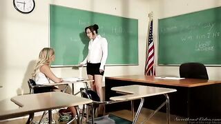 The girl is having problems with mathematics and the teacher called her to the table
