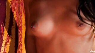 A chick with a nipple piercing plays with her tits and fingers