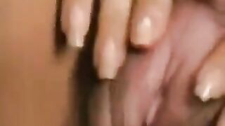 Finger-fucking hairy pussy with a big clitoris