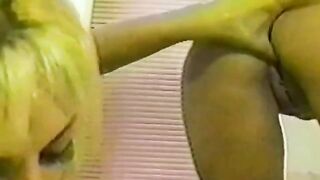 Two girls are having fun with each other in the shower