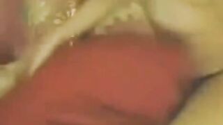 An Asian woman masturbates in front of the webcam with a strong desire