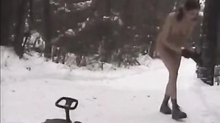 Naked beauties have fun with snowballs in the street in winter