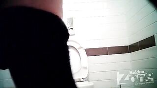 A girl pees in the toilet and there is a camera hidden