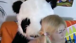 A cute girl has sex with her favorite bear in a passionate act