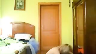 A hidden camera captures intimate moments at home in this eporn video