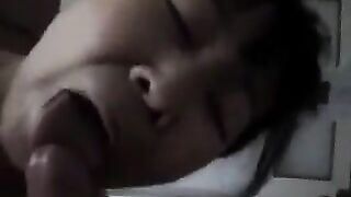 The Chinese woman practices blowjob with her tongue