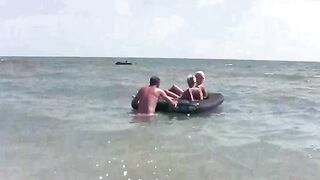 A naked girl is having fun on the mattress, embodying wild freedom