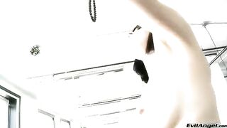 A brunette woman puts the balls in her vagina and finishes