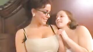 A mother is having fun with her young daughter