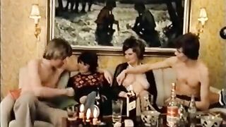 A guy is giving a lesson in sex to two depraved girls