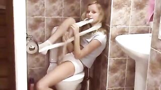 Blonde surprises her lover in the public toilet