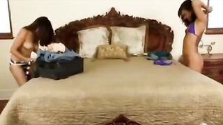 The Asian is engaged in gentle lesbian sex directly in bed