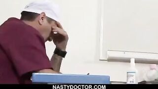 The doctor used a device to extend the girl's pussy during the exam