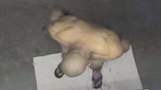 A man washed naked in the shower, not knowing he was being filmed