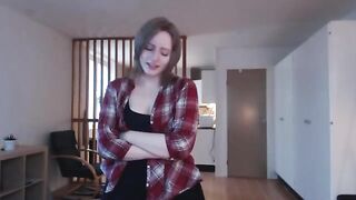 The girl plays with a big dildo and imitates the act of intimacy with it