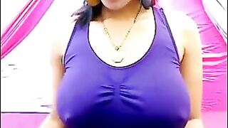 Her nipples are standing out, her t-shirt is too small for her