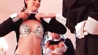 Three girls have lesbian sex under the influence of a nun