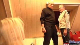 A young girl has sex with a man with a gray beard