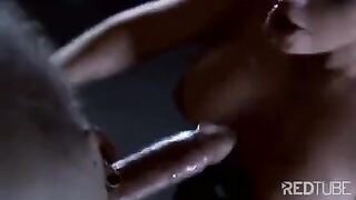 A slave is being punished for his mistress, forced to lick