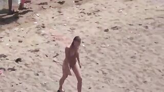 A couple of naked people in the middle of the sea, it's beautiful