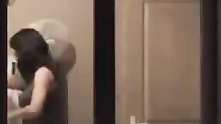 A hot brunette admire himself in the mirror completely naked