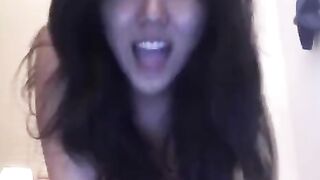Asian beauty masturbates on her bed and shows her skills